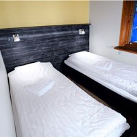 Brändön Lodge - Schlafzimmer mit Einzelbetten